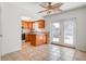 Bright dining area adjacent to the kitchen features tile flooring and double doors leading to the outside at 4570 69Th N Ave, Pinellas Park, FL 33781