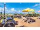 Outdoor picnic tables beneath a sunny sky offer a relaxed dining experience near the beach at 505 67Th Ave # 5, St Pete Beach, FL 33706