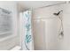 Bright bathroom with a shower and a refreshing 'Advice From The Ocean' wall art at 505 67Th Ave # 5, St Pete Beach, FL 33706