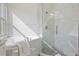 Elegant bathroom with marble shower and soaking tub at 5226 Golf Links Blvd, Zephyrhills, FL 33541