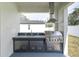 This outdoor kitchen features a stainless steel grill, sink, and counter space for entertaining and cooking at 5331 71St N Way, St Petersburg, FL 33709