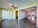 Dining room with wood-look floors and views into other rooms at 6025 Shore S Blvd # 504, Gulfport, FL 33707