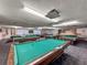 Community game room featuring multiple billiard tables and shuffleboard at 6025 Shore S Blvd # 504, Gulfport, FL 33707