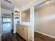 Condo hallway with kitchen and pantry access at 6025 Shore S Blvd # 504, Gulfport, FL 33707