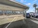 Covered parking carport with two parking spots available at 6025 Shore S Blvd # 504, Gulfport, FL 33707