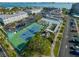 Well-maintained tennis court nestled within a vibrant community at 6025 Shore S Blvd # 504, Gulfport, FL 33707