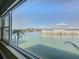 Stunning water view from large window, showing marina and buildings at 6025 Shore S Blvd # 504, Gulfport, FL 33707