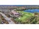 A beautiful aerial view of the community's amenities, golf course, and surrounding landscapes in River Strand at 6467 Willowshire Way, Bradenton, FL 34212