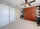 Flex room featuring built in shelving and views into the bedroom at 6467 Willowshire Way, Bradenton, FL 34212