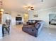 Open-concept living room with an easy flow to the kitchen and dining areas at 6467 Willowshire Way, Bradenton, FL 34212