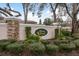 Gated entrance to River Bend community with landscaping at 6538 Green Acres Blvd, New Port Richey, FL 34655