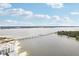 Stunning coastal aerial shot showcasing a bridge and buildings along the waterfront at 684 Bayway Blvd, Clearwater, FL 33767