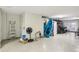 Large garage space with kayaks, bicycles, and various storage items at 684 Bayway Blvd, Clearwater, FL 33767