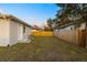 Spacious backyard with a wooden fence at 701 E Wood St, Tampa, FL 33604