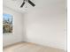 Well-lit bedroom featuring hardwood floors and ceiling fan at 701 E Wood St, Tampa, FL 33604