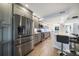 Modern kitchen featuring stainless steel appliances and a large island counter at 7501 Cumberland Rd # 22, Seminole, FL 33777