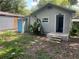 View of house exterior and backyard from behind at 8004 N 11Th St, Tampa, FL 33604