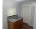 Simple kitchen with double sink and wood cabinets at 8004 N 11Th St, Tampa, FL 33604