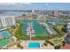 Expansive marina and community pool with views of the inter coastal waterway and city skyline at 8040 Sailboat Key S Blvd # 304, St Pete Beach, FL 33707