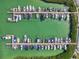 Aerial view of a marina showing numerous boats docked in the water at 8040 Sailboat Key S Blvd # 304, St Pete Beach, FL 33707