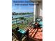 Balcony with outdoor seating, perfect for enjoying the water view and coastal scenery at 8040 Sailboat Key S Blvd # 304, St Pete Beach, FL 33707