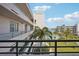 Relaxing balcony view of the pool and inter-coastal waterway, perfect for enjoying the beautiful scenery at 8040 Sailboat Key S Blvd # 304, St Pete Beach, FL 33707