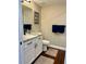 Cozy guest bathroom featuring warm-toned walls and modern fixtures at 8040 Sailboat Key S Blvd # 304, St Pete Beach, FL 33707