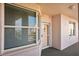 Charming exterior entrance with a large window, side window and a welcoming doorway to a cozy condo at 8040 Sailboat Key S Blvd # 304, St Pete Beach, FL 33707