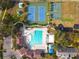 Aerial shot showcasing the community's pool, tennis courts, and basketball court at 814 Tuscanny St, Brandon, FL 33511