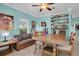 Welcoming dining area showcasing a wooden table, comfortable seating, and a stylish blend of modern and classic decor at 868 Date Palm Ln, St Petersburg, FL 33707