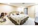 Spacious bedroom with king-size bed and ample light at 8807 Oak Cir, Tampa, FL 33615