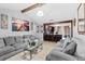 Inviting living room featuring modern decor, comfortable seating, and an open layout into the kitchen at 8903 Bay Bridge Ct, Tampa, FL 33634