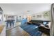 Open concept layout with a spacious living room and kitchen, perfect for entertaining at 10201 127Th Pl, Largo, FL 33773