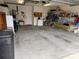 Attached garage with shelving and storage at 11425 Billingham Blvd, Spring Hill, FL 34609