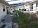 Backyard walkway with patio area and central air conditioning unit at 12400 Park Blvd # 417, Seminole, FL 33772