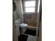 Bathroom featuring a tiled shower with a window and modern fixtures at 12400 Park Blvd # 417, Seminole, FL 33772