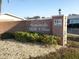 Entrance to the 55+ Seminole Hill Villas community with brick signage and manicured landscaping at 12400 Park Blvd # 417, Seminole, FL 33772