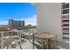 Enjoy city views from this furnished balcony, complete with a table and chairs at 145 2Nd S Ave # 523, St Petersburg, FL 33701