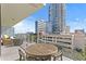 Outdoor balcony with table and chairs, offering city views at 145 2Nd S Ave # 523, St Petersburg, FL 33701