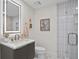 Modern bathroom with a glass shower, updated vanity, and elegant tile at 145 2Nd S Ave # 523, St Petersburg, FL 33701