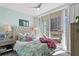 Bright bedroom with a comfortable bed and city views at 145 2Nd S Ave # 523, St Petersburg, FL 33701