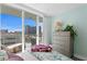 Bedroom with dresser and access to balcony with city views at 145 2Nd S Ave # 523, St Petersburg, FL 33701