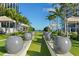 Well-maintained common green space with planters and covered outdoor seating area at 145 2Nd S Ave # 523, St Petersburg, FL 33701