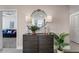 Entryway features a console table, mirror, and potted plants at 145 2Nd S Ave # 523, St Petersburg, FL 33701