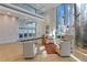 Elegant lobby with soaring ceilings, floor-to-ceiling windows, modern furnishings, and marble floors at 145 2Nd S Ave # 523, St Petersburg, FL 33701