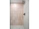 Walk-in shower with hexagon floor tile and pink wall tile at 145 2Nd S Ave # 523, St Petersburg, FL 33701
