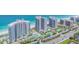 Aerial view of beachfront condos, tennis courts and pool at 1540 Gulf Blvd # 1705, Clearwater, FL 33767