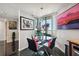 Cozy dining area featuring a round glass table and a waterfront view at 1540 Gulf Blvd # 1705, Clearwater, FL 33767