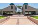 Covered parking and a paver driveway with a decorative central garden at 1540 Gulf Blvd # 1705, Clearwater, FL 33767