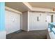 Exterior hallway with double door entrance into the home at 1540 Gulf Blvd # 1705, Clearwater, FL 33767